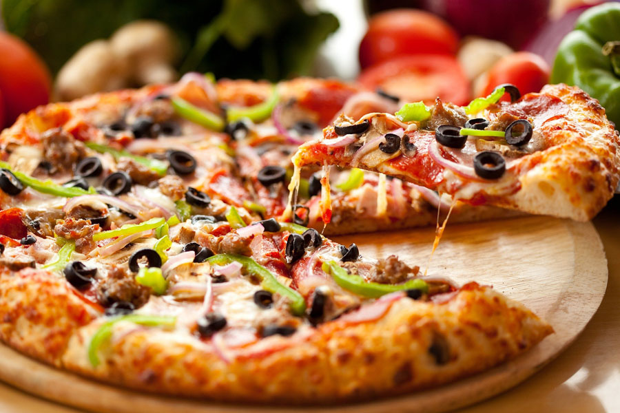 Serving a third slice of pizza.